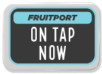 Sign displaying 'Fruitport On Tap Now' in a bold, modern design.