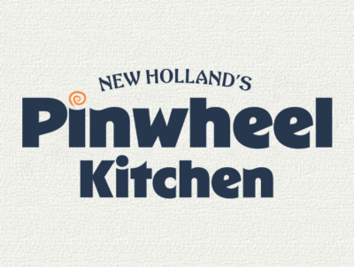 Logo of New Holland's Pinwheel Kitchen featuring stylized text and a spiral design.
